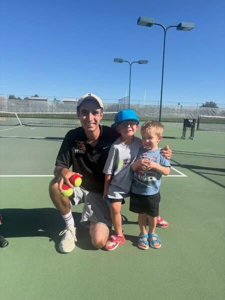 Coach Matt with two Red Ball players