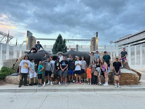 adidas Tennis Camp group by the Rams statues at Colorado State University